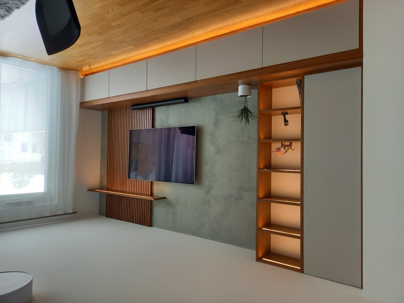 Wohnzimmer- und Homeoffice-Einrichtung von Kollmann Wohndesign